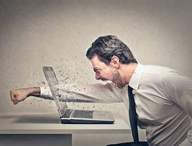 Man raging at an object